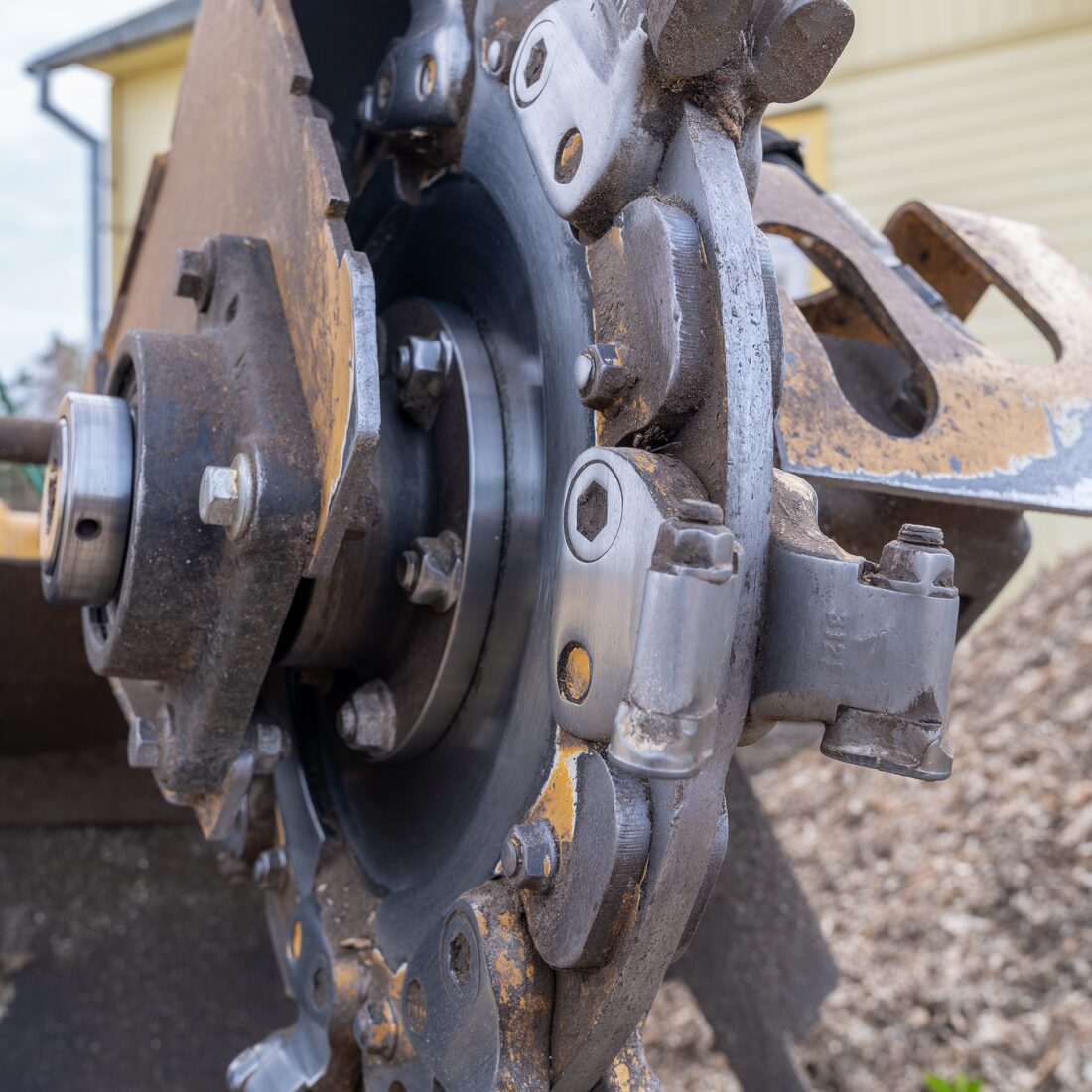 Close-up of a professional stump grinder wheel